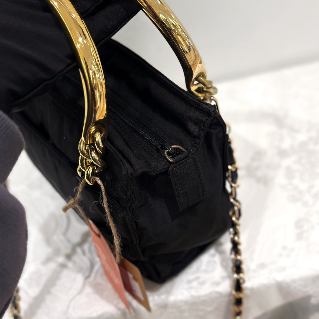 Prada vintage nylon bag with gold handle
