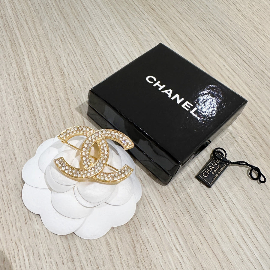 Chanel CC brooch