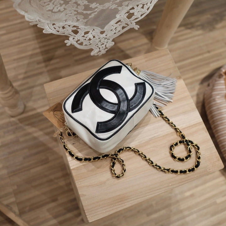 Chanel vintage CC camera crossbody bag with tassel