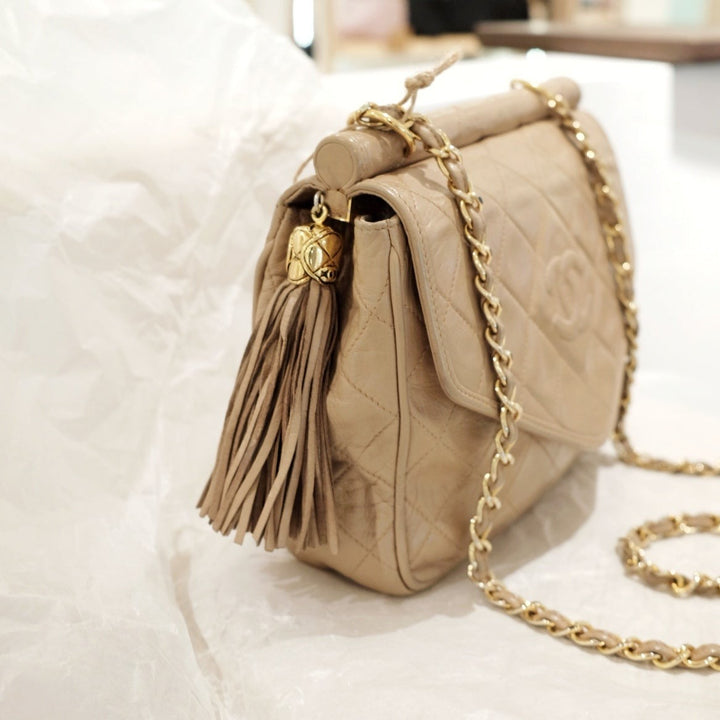 Chanel vintage tassel flap chain bag