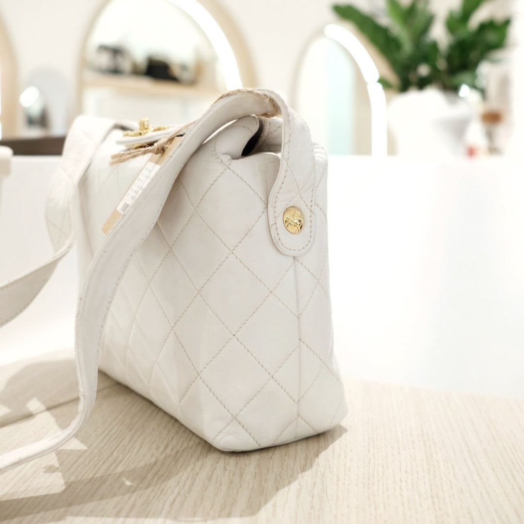 Chanel vintage diamond logo post bag