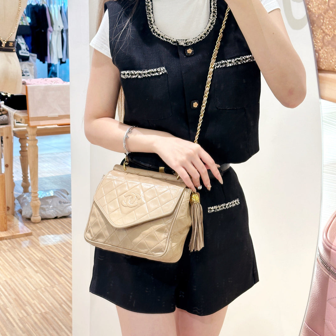 Chanel vintage tassel flap chain bag