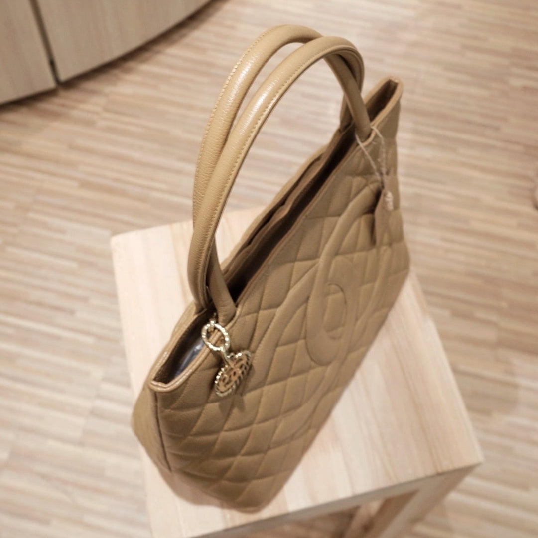 Chanel vintage medallion beige tote bag