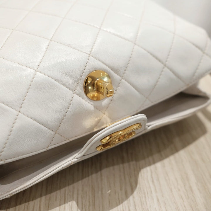 Chanel vintage diamond logo post bag