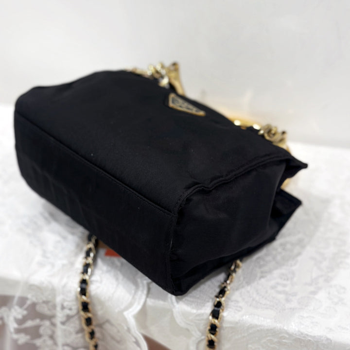 Prada vintage nylon bag with gold handle