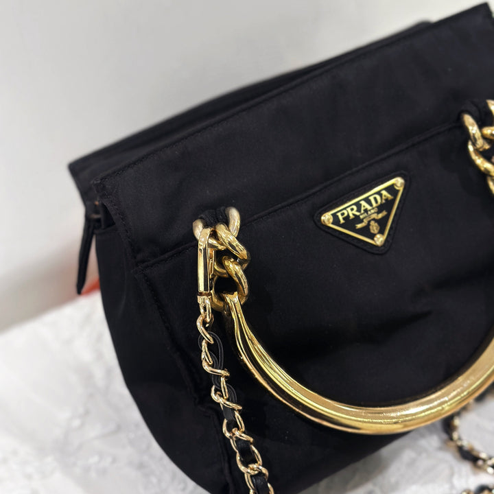 Prada vintage nylon bag with gold handle