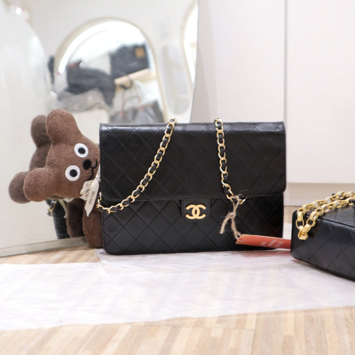 Chanel vintage woc flap chain bag black