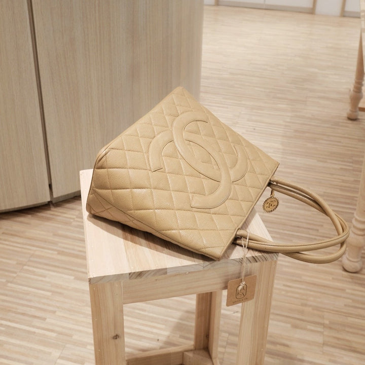Chanel vintage medallion beige tote bag