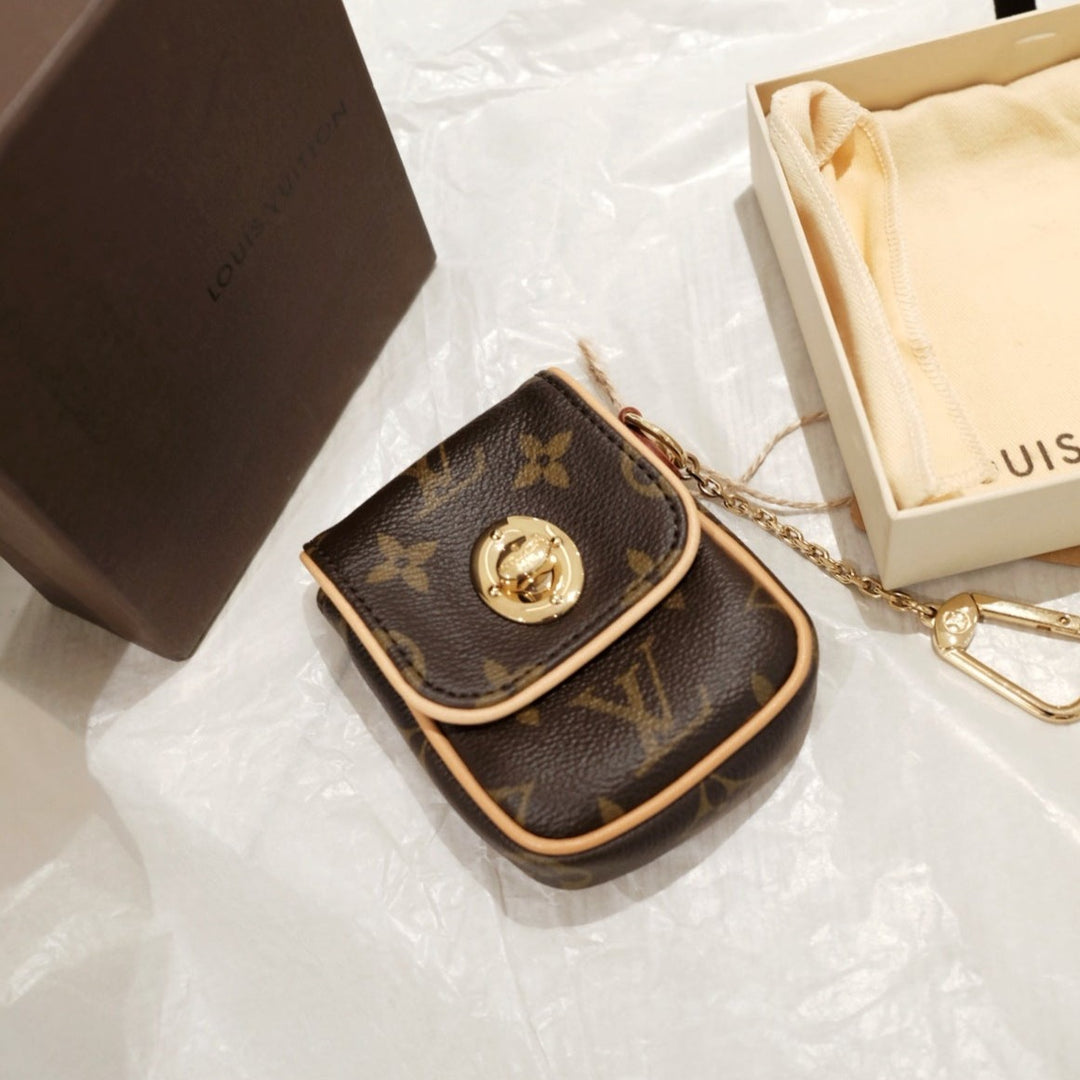 Lv vintage 2006 mini monogram pochette tulam purse