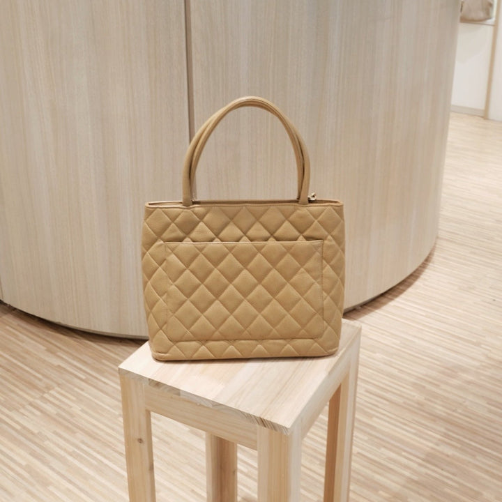 Chanel vintage medallion beige tote bag