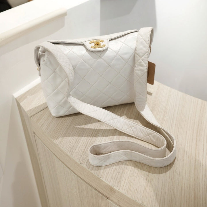 Chanel vintage diamond logo post bag