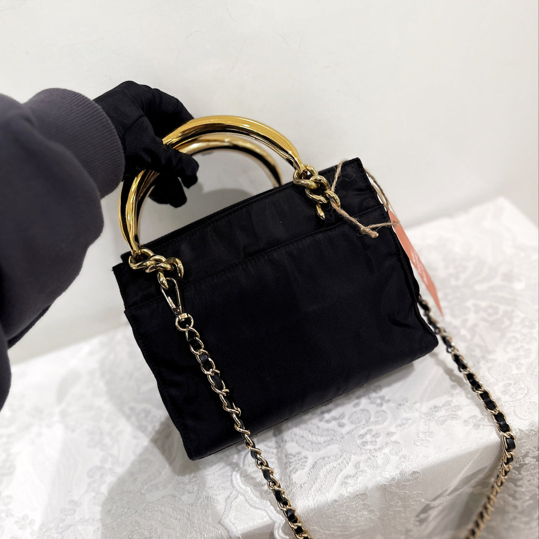Prada vintage nylon bag with gold handle