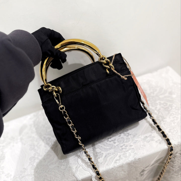 Prada vintage nylon bag with gold handle