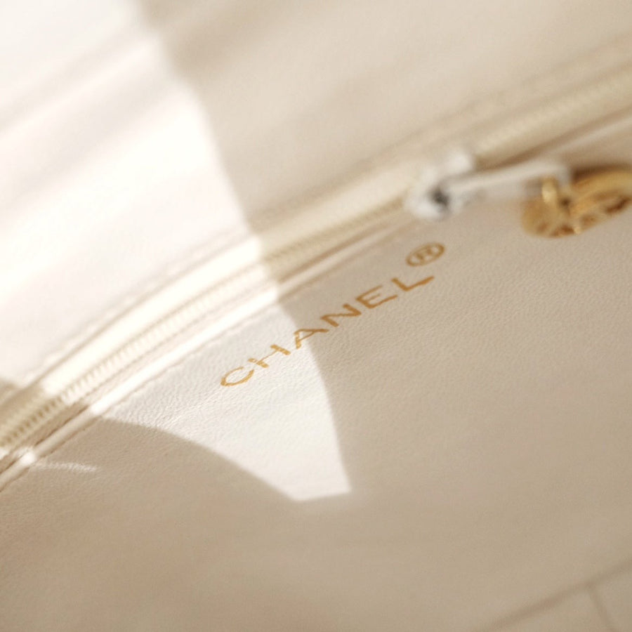 Chanel vintage diamond logo post bag