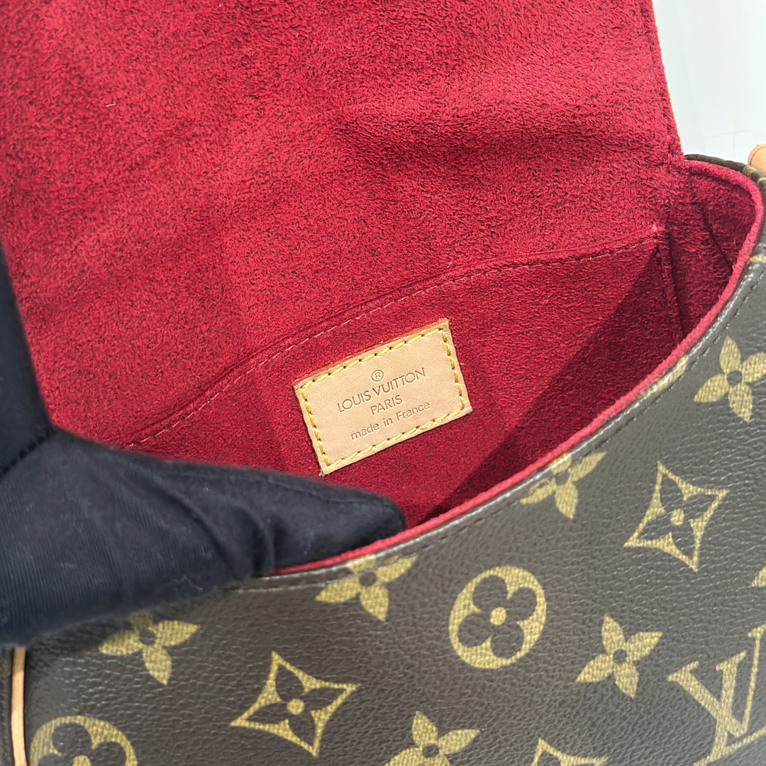 Louis Vuitton monogram sack tambran shoulder bag