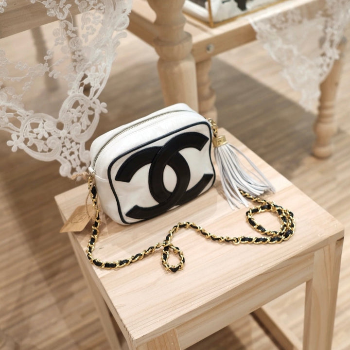 Chanel vintage CC camera crossbody bag with tassel