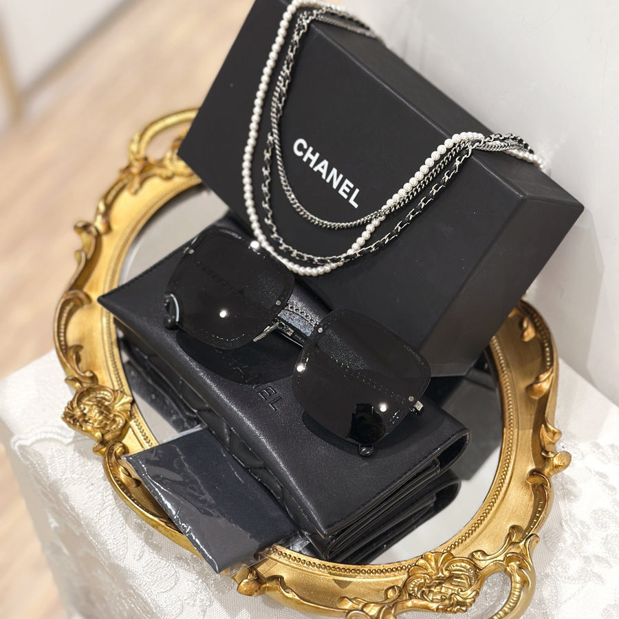Chanel sunglasses with chains