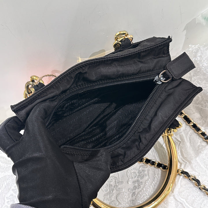 Prada vintage nylon bag with gold handle