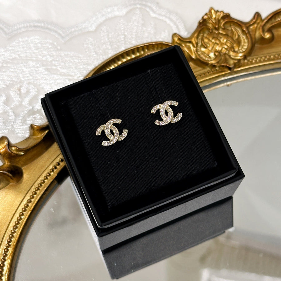 Chanel CC logo earrings F24V (gold)