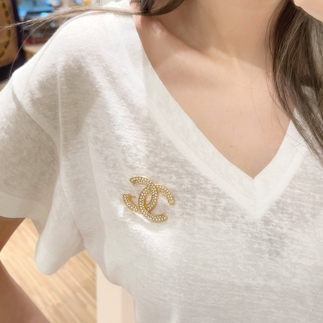 Chanel CC brooch
