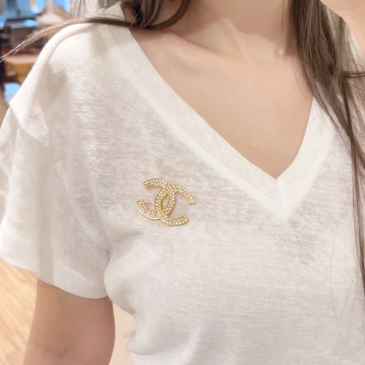 Chanel CC brooch