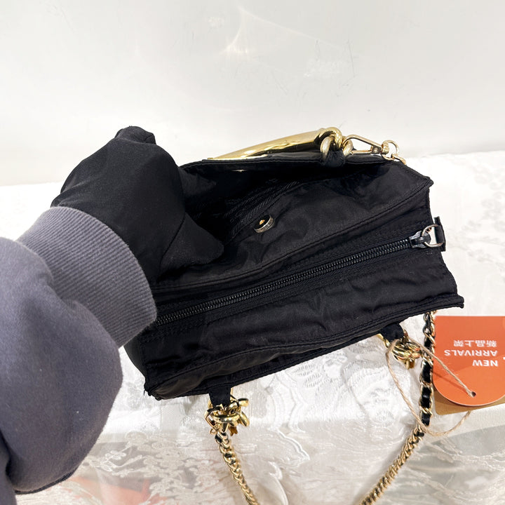 Prada vintage nylon bag with gold handle