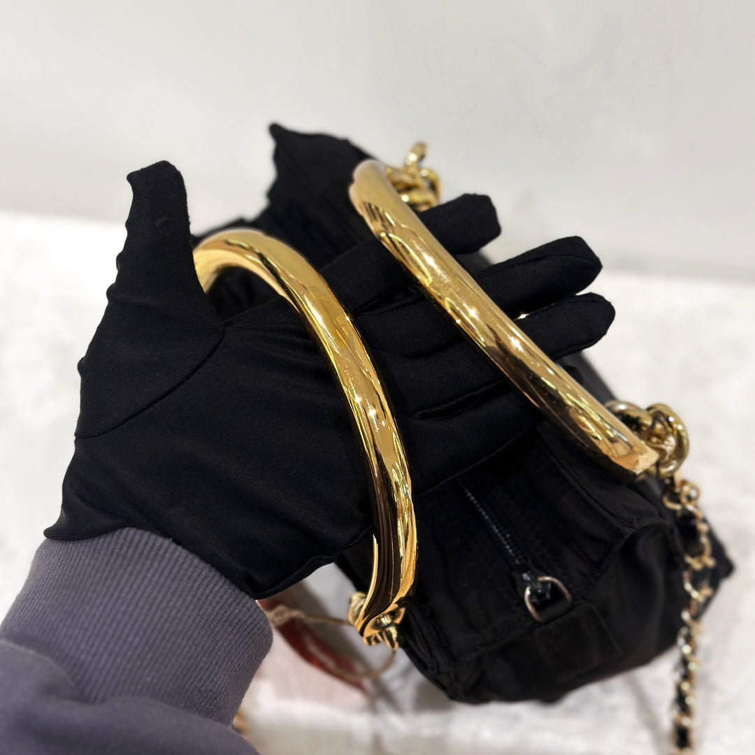 Prada vintage nylon bag with gold handle