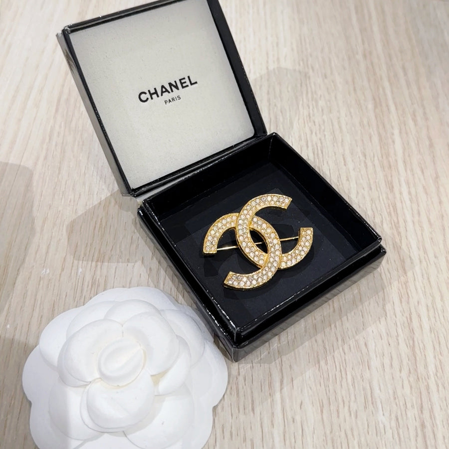 Chanel CC brooch