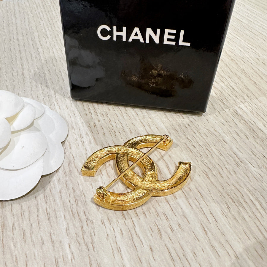 Chanel CC brooch