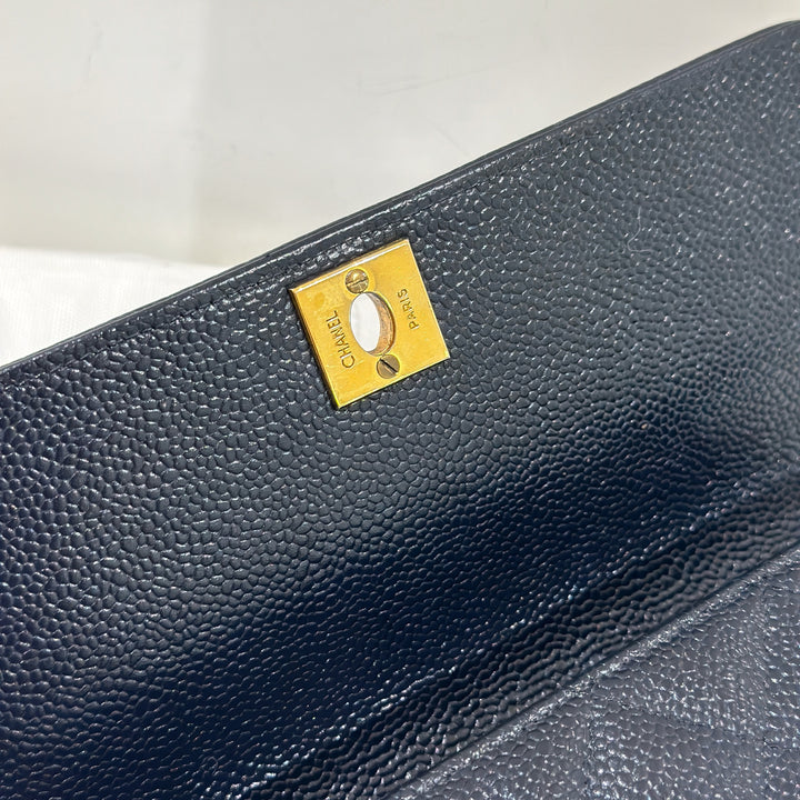 Chanel vintage navy caviar flap bag