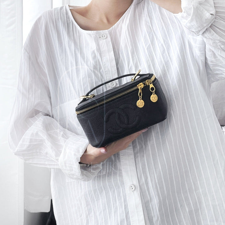Chanel vintage coco cowhide mini wash bag