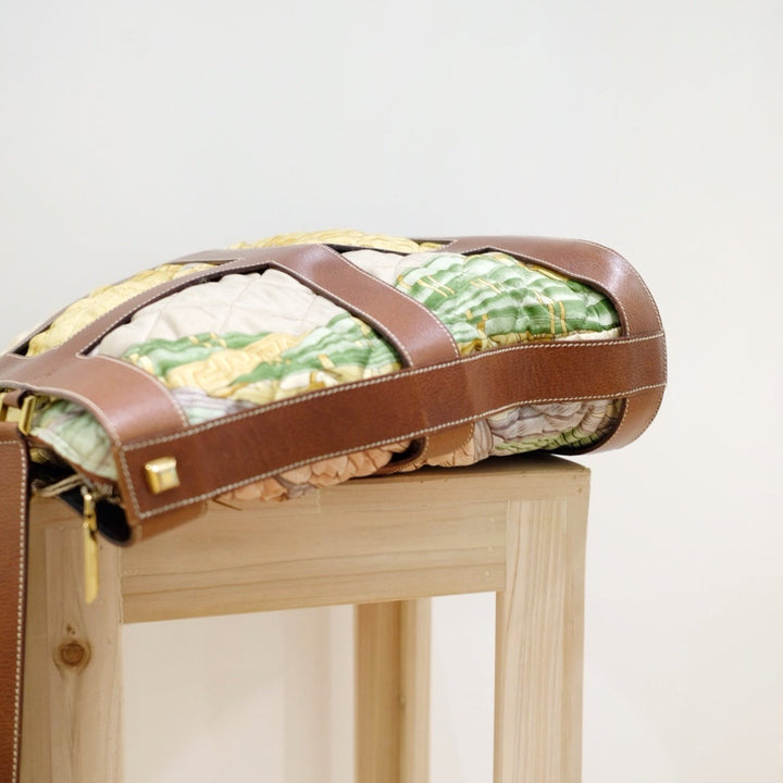 Ferragamo leather trimmed quilted tote