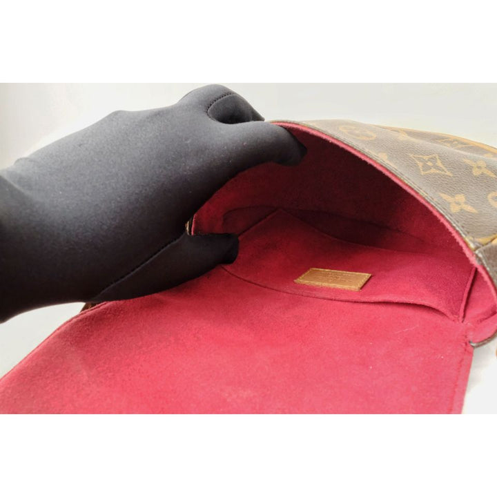 Louis Vuitton monogram sack tambran shoulder bag