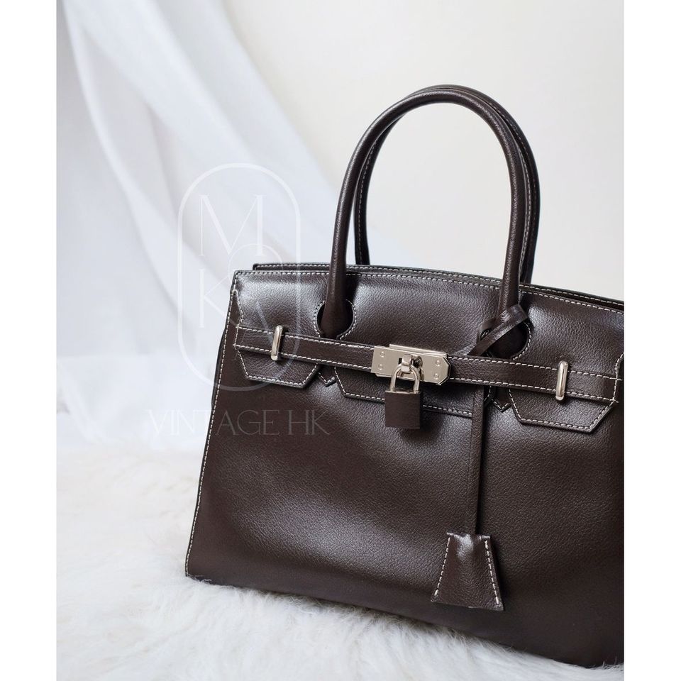 Hamano cowhide kelly handbag