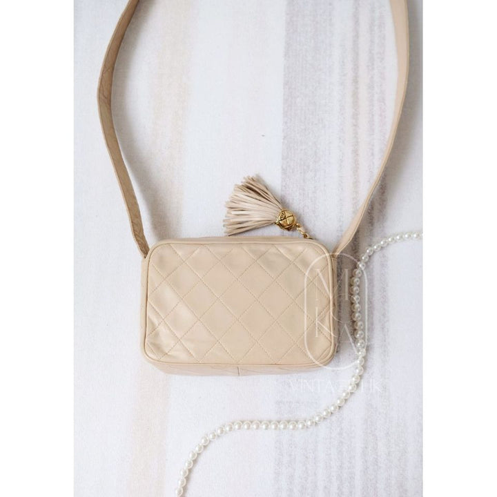 Chanel CC diamond-quilted tassel crossbody bag