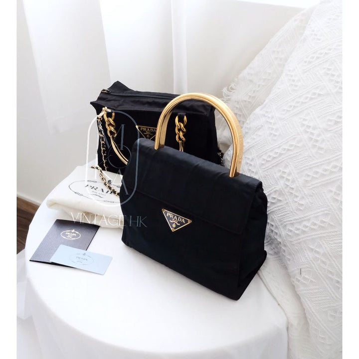 Prada vintage dark blue nylon kelly bag with gold handle