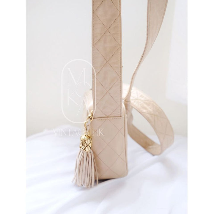 Chanel CC diamond-quilted tassel crossbody bag