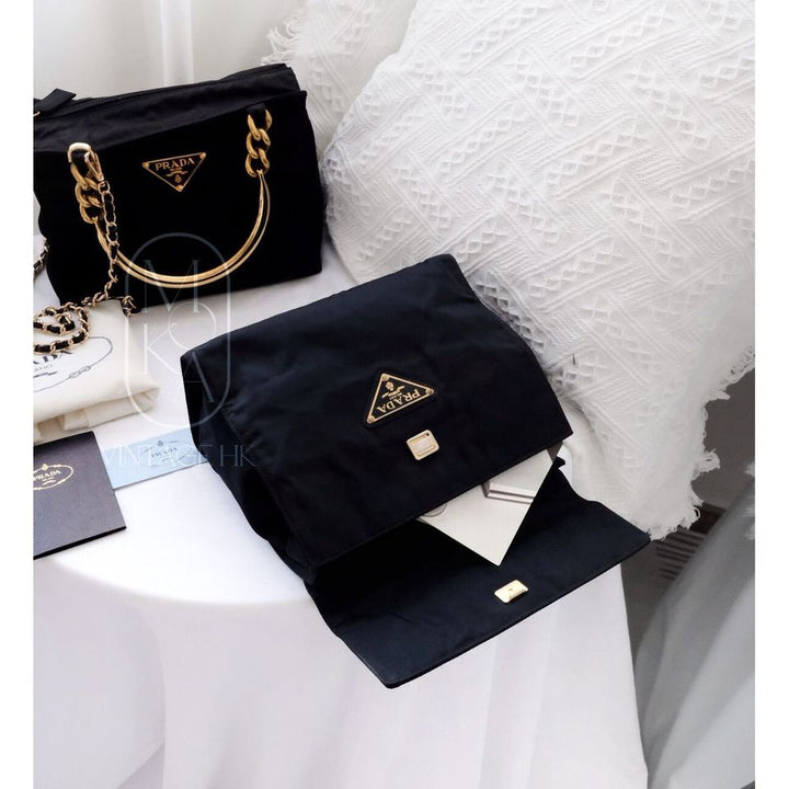 Prada vintage dark blue nylon kelly bag with gold handle