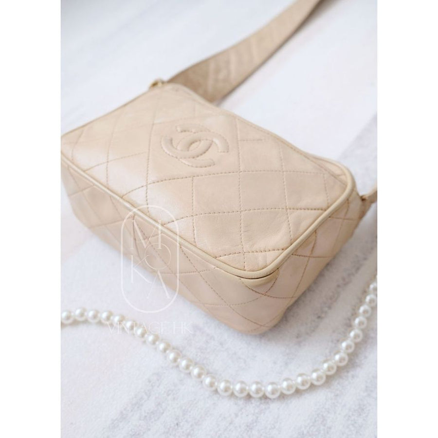 Chanel CC diamond-quilted tassel crossbody bag