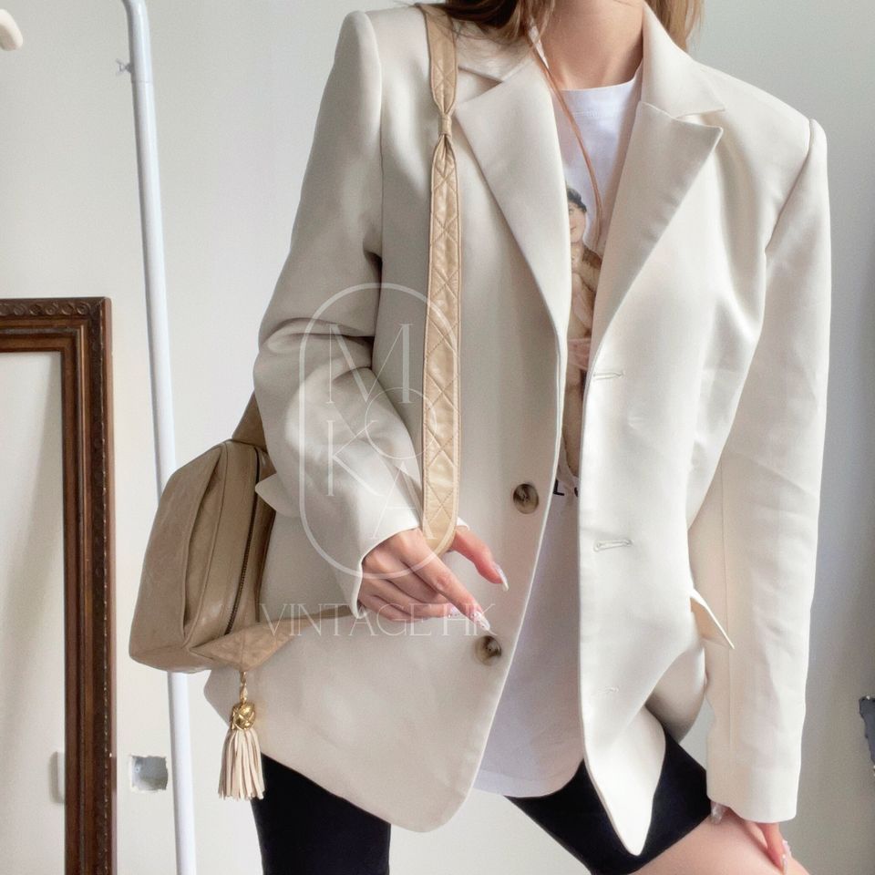 Chanel CC diamond-quilted tassel crossbody bag