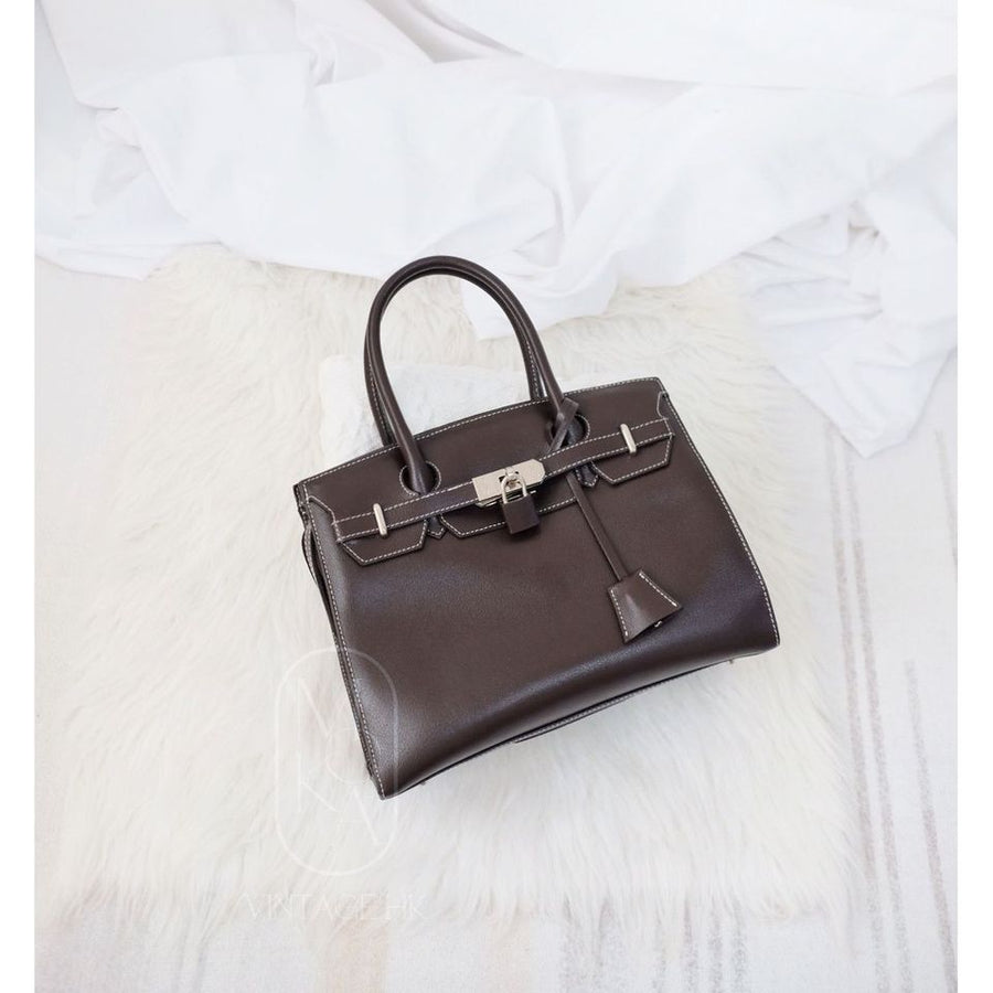 Hamano cowhide kelly handbag