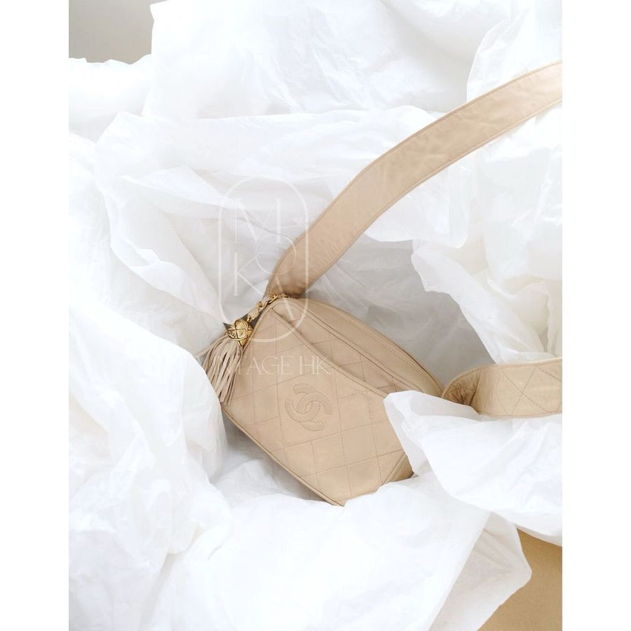 Chanel CC diamond-quilted tassel crossbody bag