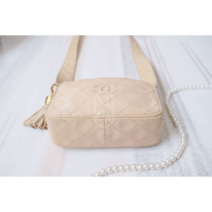 Chanel CC diamond-quilted tassel crossbody bag