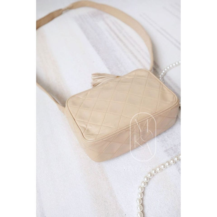 Chanel CC diamond-quilted tassel crossbody bag