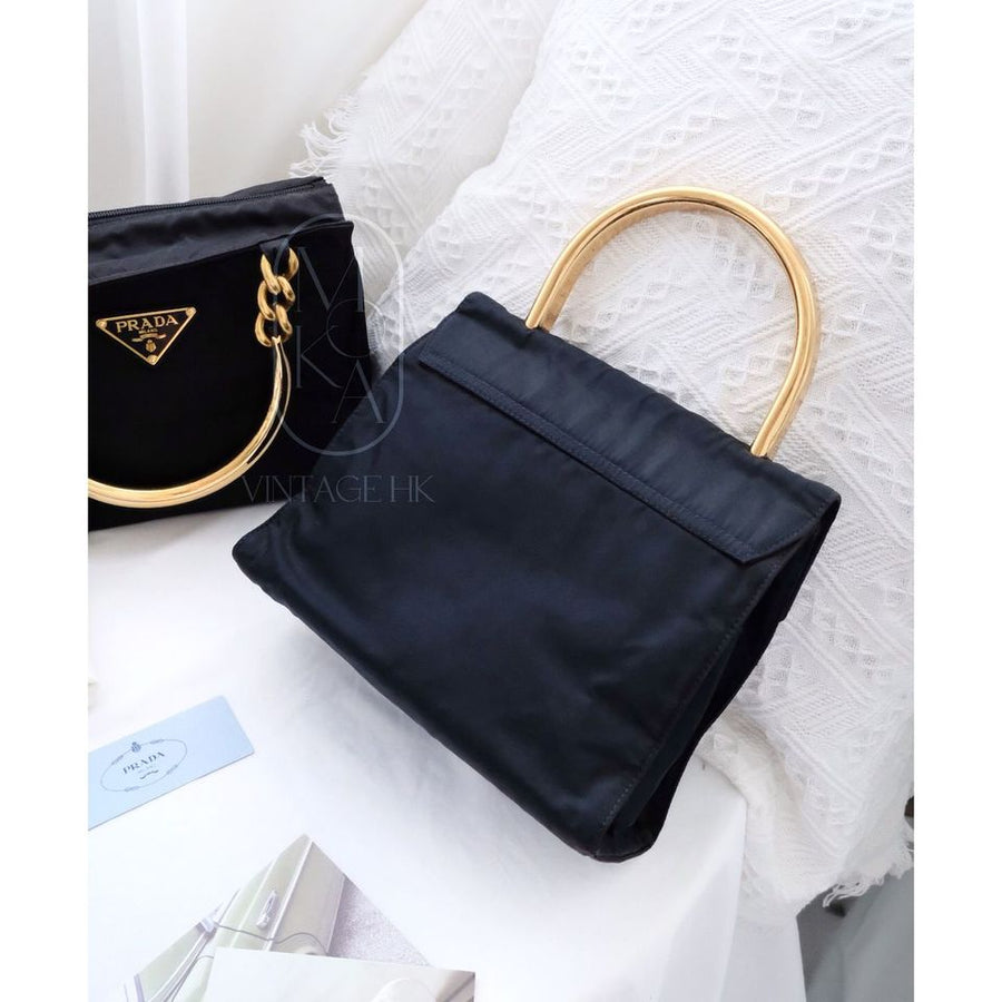 Prada vintage dark blue nylon kelly bag with gold handle