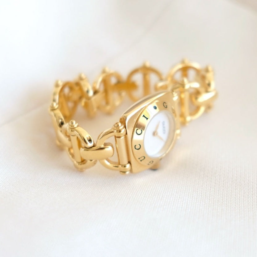 Gucci vintage 6400L mother pearl dial & horsebit chain watch