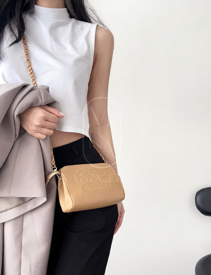 Chanel vintage beige quilted cowhide pouch +chain