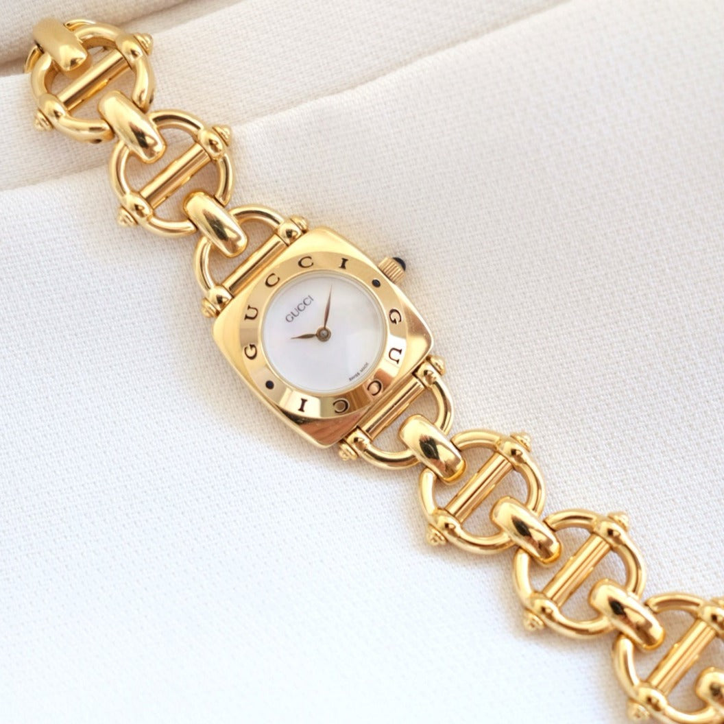 Gucci vintage 6400L mother pearl dial & horsebit chain watch