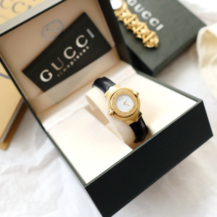 Gucci vintage gold swivel-twirl wristwatch