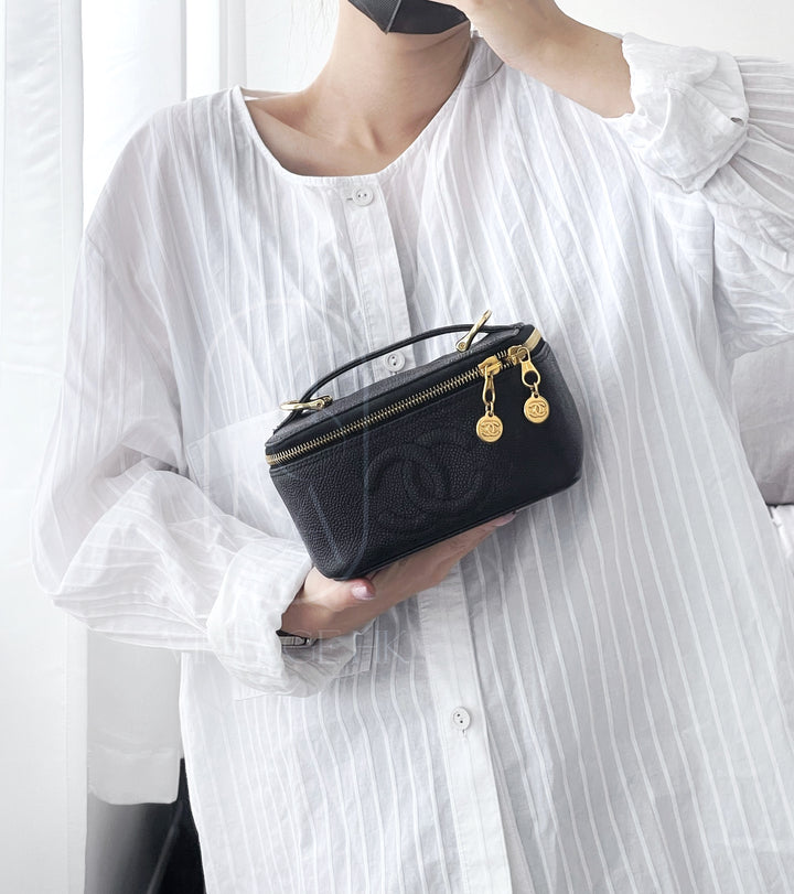 Chanel vintage coco cowhide mini wash bag